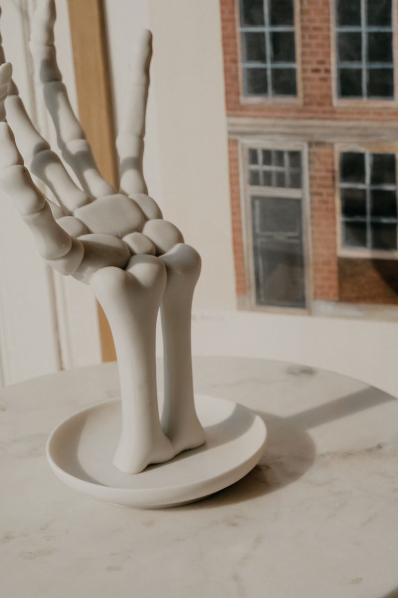 Hollie Skeleton Matt White Hand Holder