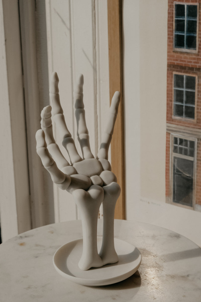 Hollie Skeleton Matt White Hand Holder